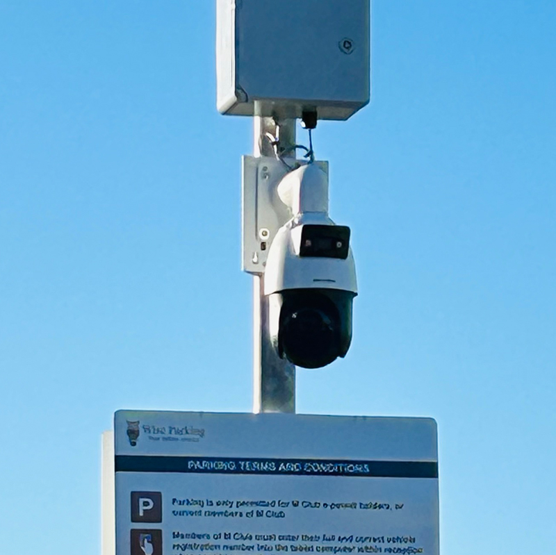 CCTV enforcement camera on car parking sign